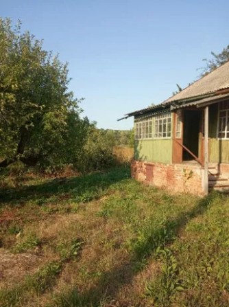 Продам участок с домом в Люботине - изображение 1