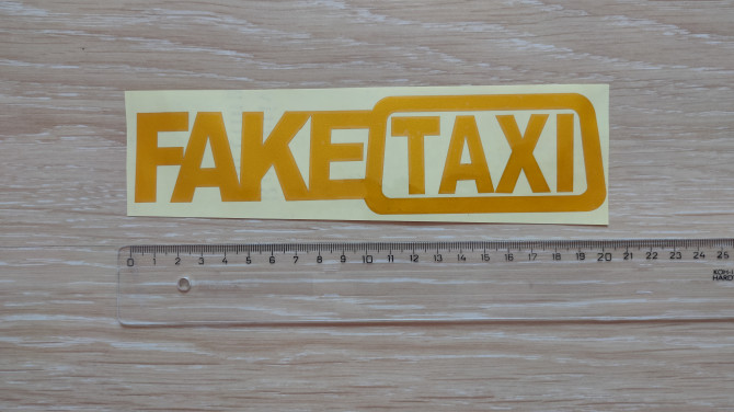Наклейка на авто FakeTaxi желтая светоотражающая - изображение 1