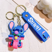 Брелок Disney Lilo & Stitch — синій Стіч на триколісному велосипе...